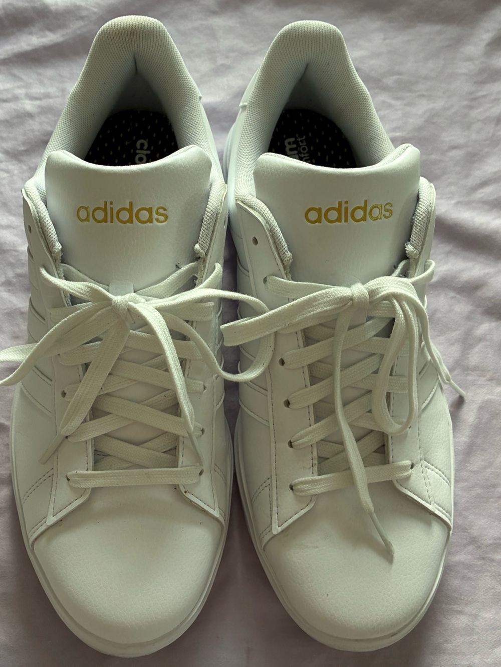 adidas White Low-Top Sneakers with Gold Branding